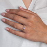 Model wears Amethyst Hammered Sterling Silver Ring , with a white blouse and frenchtip manicured nails.