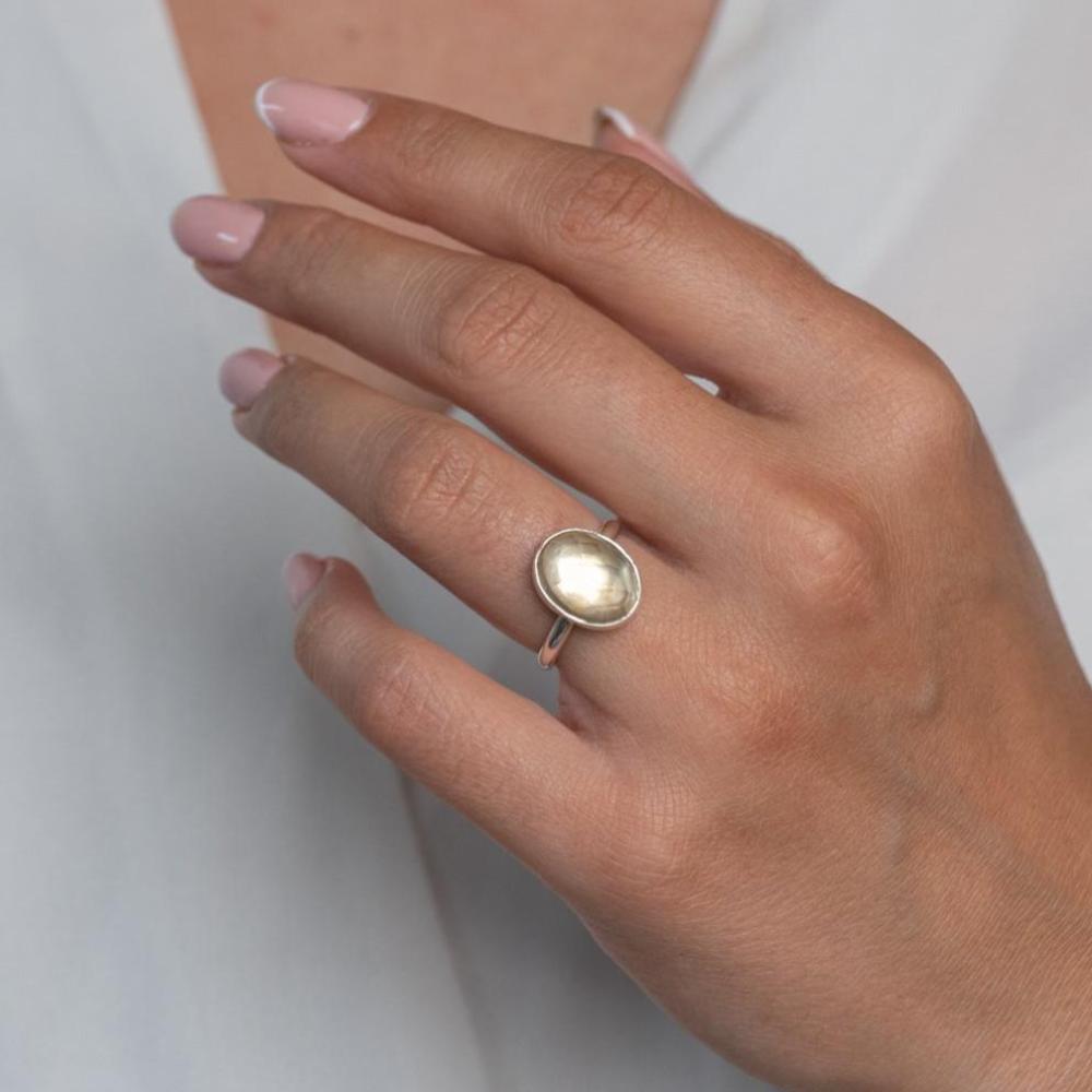 Sterling Silver Citrine Statement Ring worn on model's left hand.