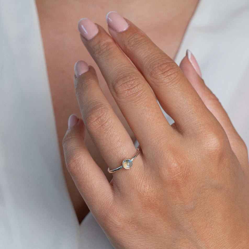 Labradorite Sterlig Silver Hammered Stacking Ring worn on a models hand with french nails.