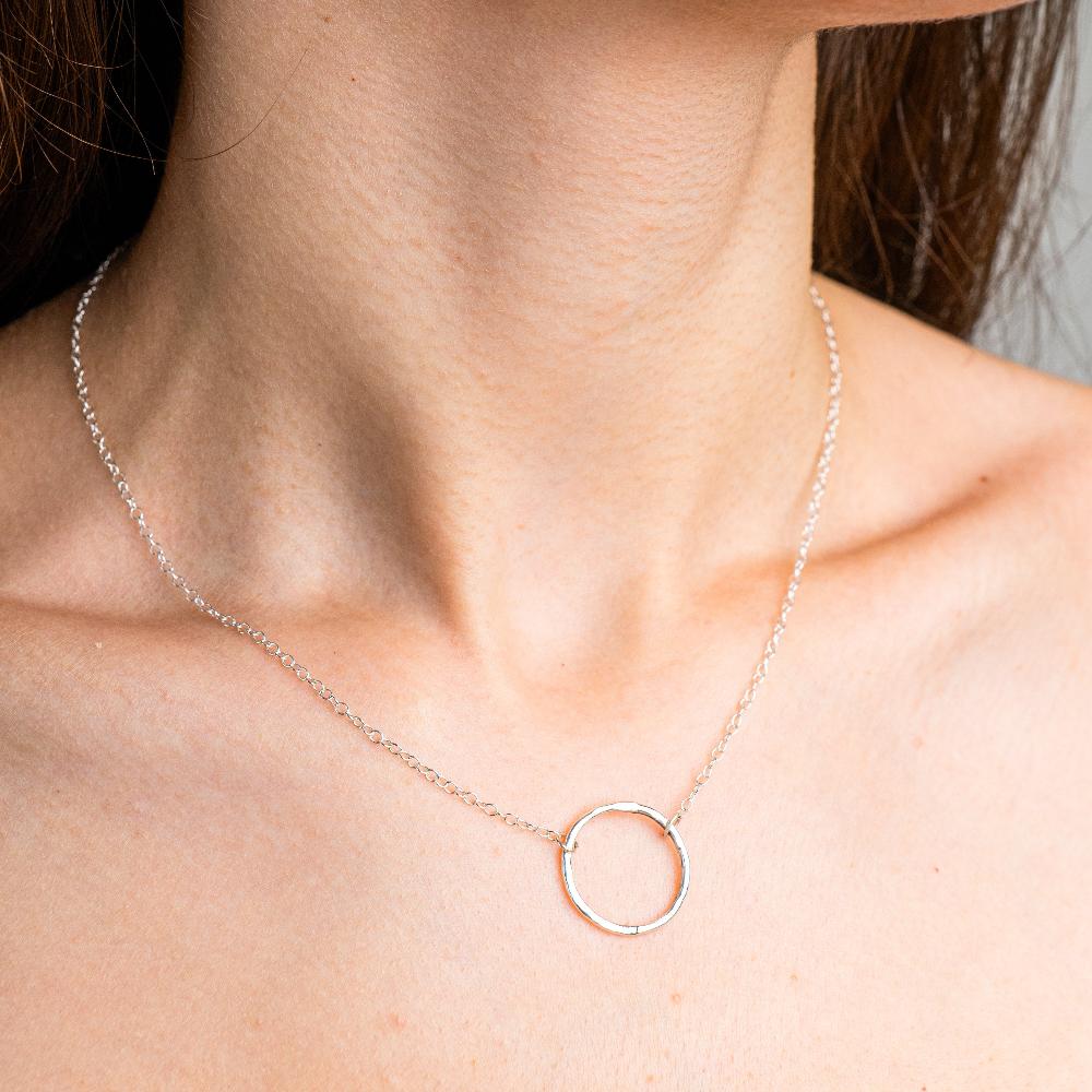 Lunar Necklace worn on model's neckline