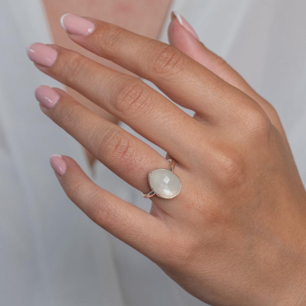 Sterling Silver Moonstone Statement Ring worn on model's left hand.