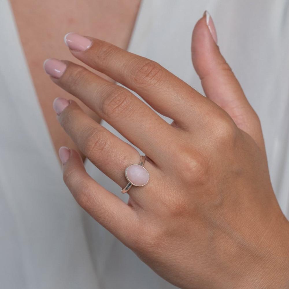 Sterling Silver Pink Opal  Statement Ring worn on model's left hand.