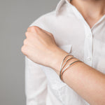 Sterling Silver Russian Bangle set worn on model's wrist