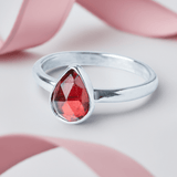 Christmas Glow: Garnet Pear Sterling Silver Ring