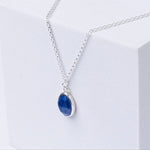 Handmade Lapis lazuli Gemstone Sterling Silver Pendent displayed on a whitebox.