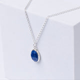 Handmade Lapis lazuli Gemstone Sterling Silver Pendent displayed on a whitebox.