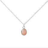 Handmade Pink Opal Gemstone Pendent set in Sterling Silver, displayed on a white background 