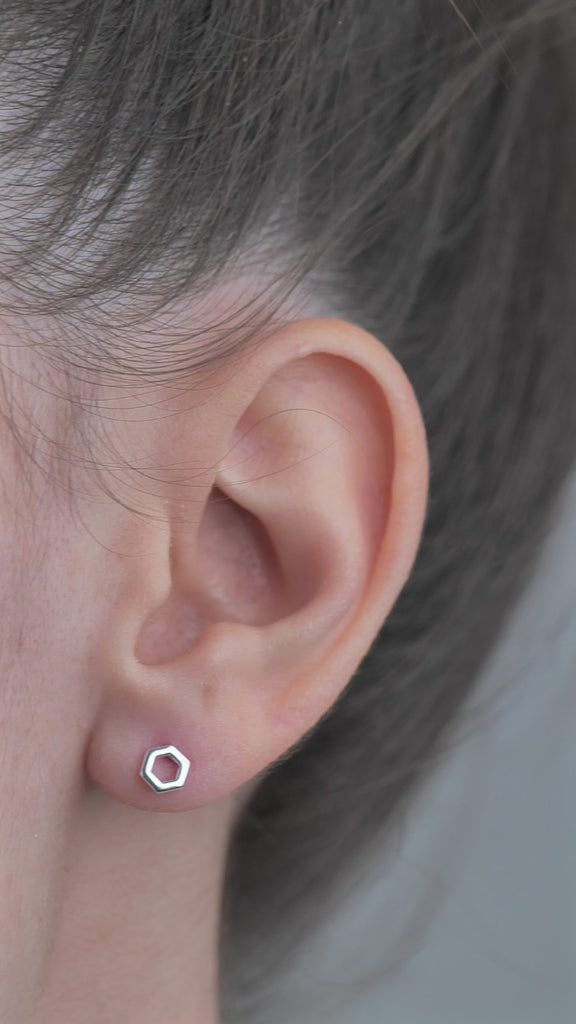 Sterling Silver Hexagon Shaped Earrings worn by model.