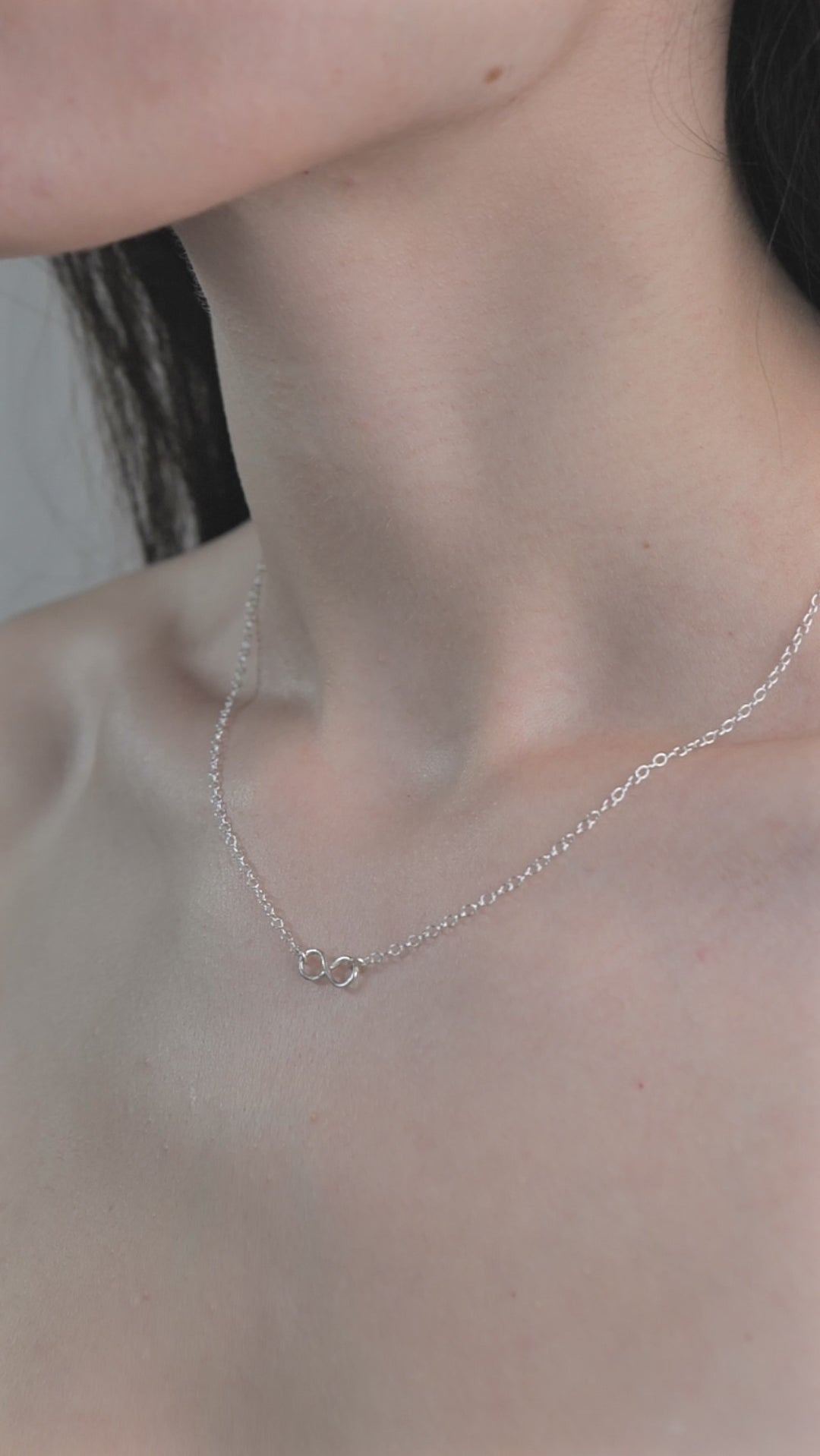 Sterling Silver Infinity Shaped Pendent Necklace worn on model