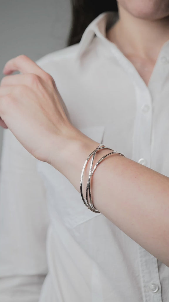 Sterling Silver Russian Bangles Sterling Silver worn on model's wrist