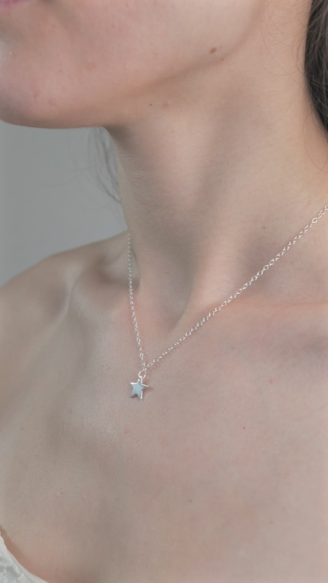 Sterling Silver Star Pendent Necklace worn on model.