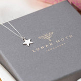 Star Sterling Silver Necklace displayed on Lunar Moth Jewellery Packaging 