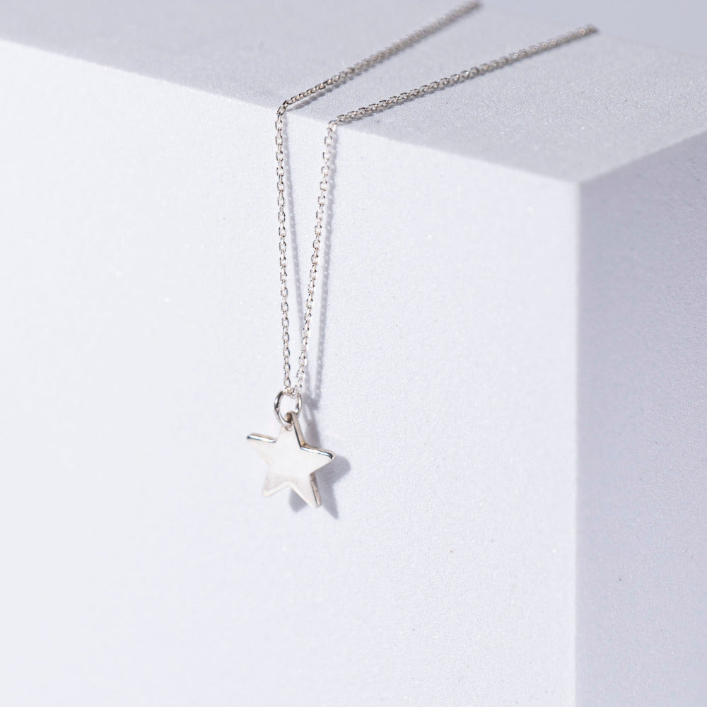 Star Pendent Sterling Silver Necklace on White Box 