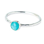 Turquoise gemstone Sterling Silver Stacking Ring with Hammered Textured band, shown on a white background